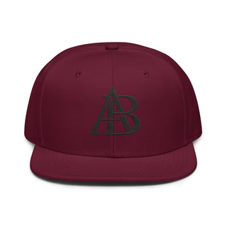 Burgundy Maroon flat brim snapback hat by Albacho – front view